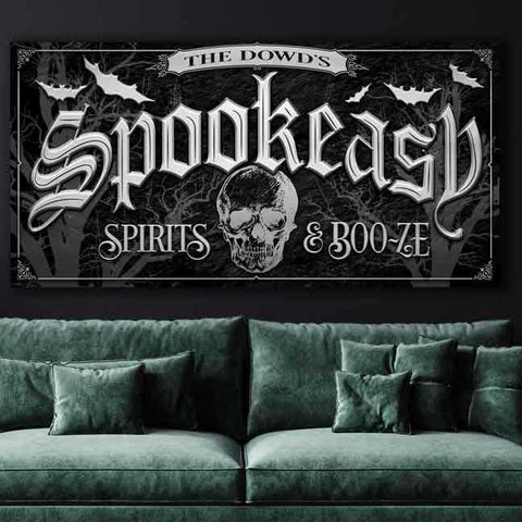 Halloween wall decor. Custom Spookeasy wall art. Black canvas with family name and creepy skull and bats. Reads "spookeasy spirits & Boo-ze" 