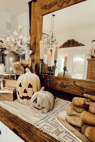 DIY pottery pumpkin display on modern farmhouse mantle