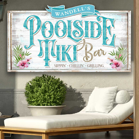 Personalized Poolside Tiki Bar Signe on White Canvas with Blue Lettering and Pink Hibiscus flowers.