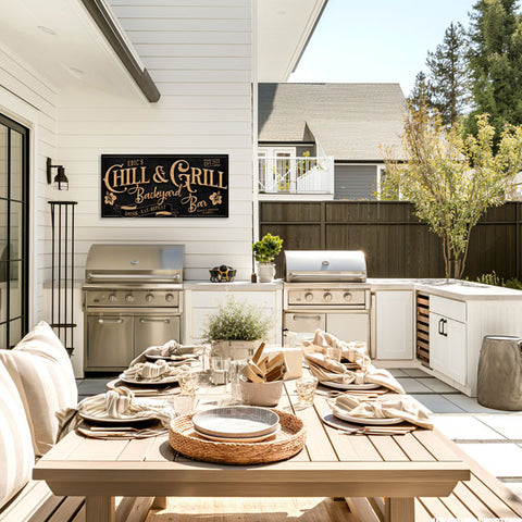 bar and grill sign with dinning table and plate settings with grill and sign in background