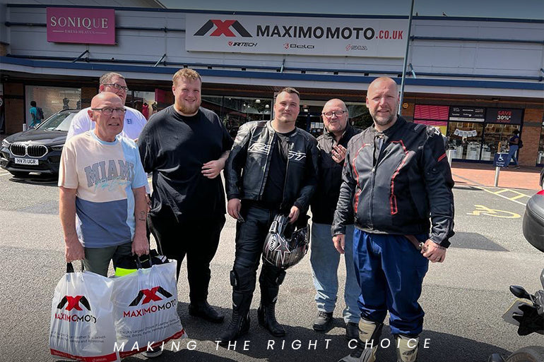 a group of happy motorcycle bikers after purchasing the motorcycle gear from maximo moto uk.