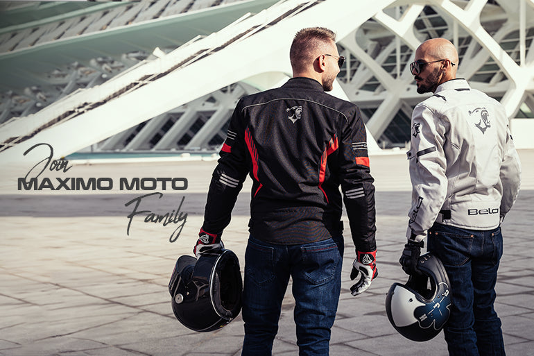 two male bike rider wearing maximo moto motorcycle gear including gloves, jackets, and pants.