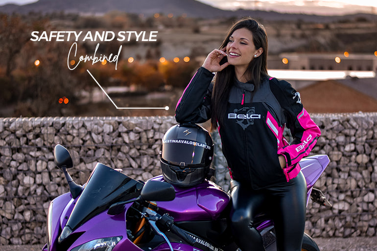 a female motorbike rider is wearing a bela elanur motorcycle jacket