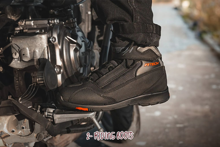 A motorbiker from the UK is dressed in black Maximo Moto racing boots.