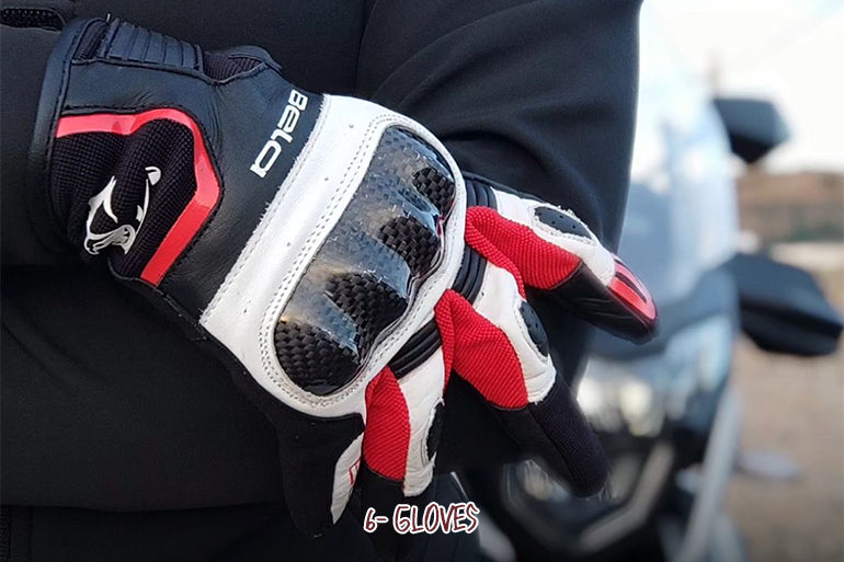 A motorbiker from the UK is wearing Bela motorcycle gloves by Maximo Moto.