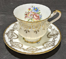 Load image into Gallery viewer, Paragon Tea Cup &amp; Saucer White, Floral &amp; Gold
