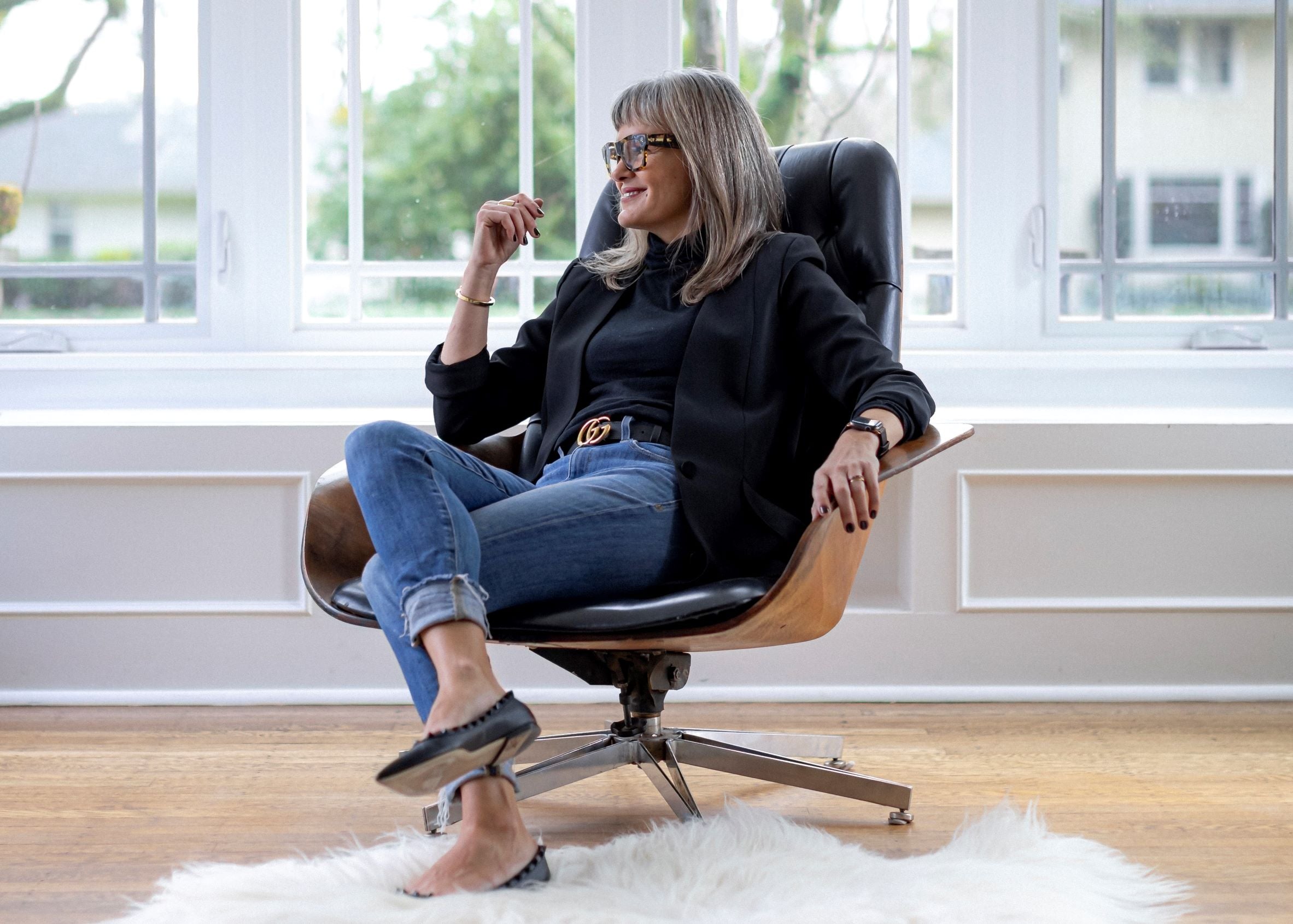 Catrina Gregory - Ford Grey owner in vintage Mr. Chair by Plycraft