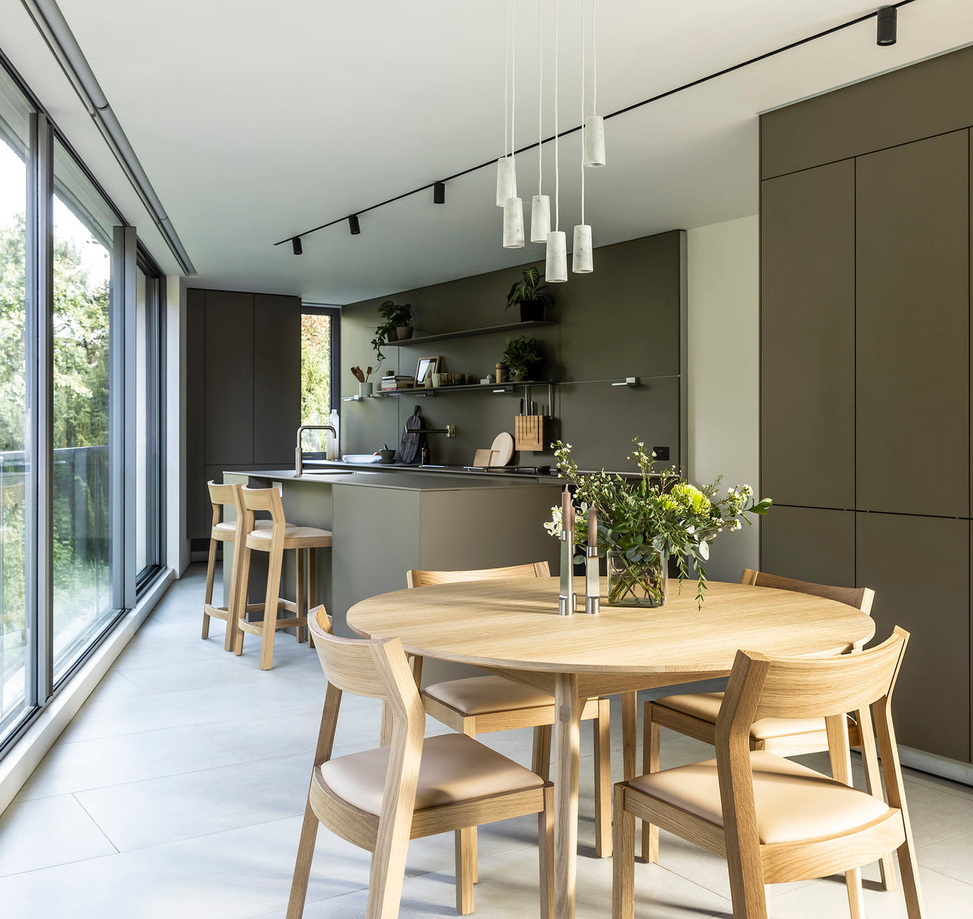 round wooden light table and chairs