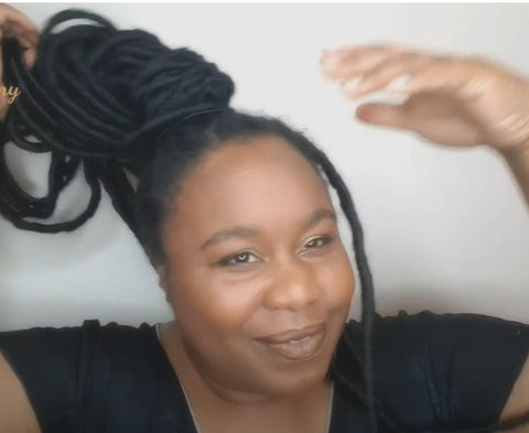 faux locs created with kinky curly clip-in extensions