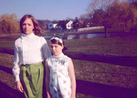 sisters in the 1960s in retro clothing