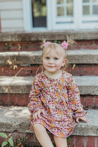 Toddler girl in fall floral dress