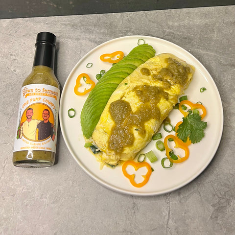 Hatch Chile salsa verde on omelette San Diego Hot Sauce fermented