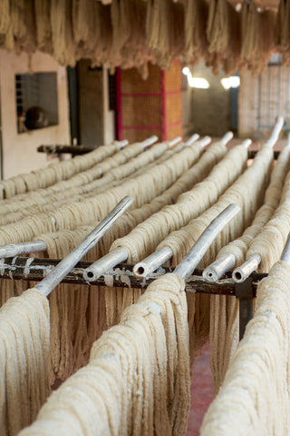 Washed Ambar Charkha Spun organic cotton at a weaving unit in India
