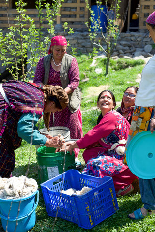 Artisan women in Himachal Pradesh wash wool ready to dye