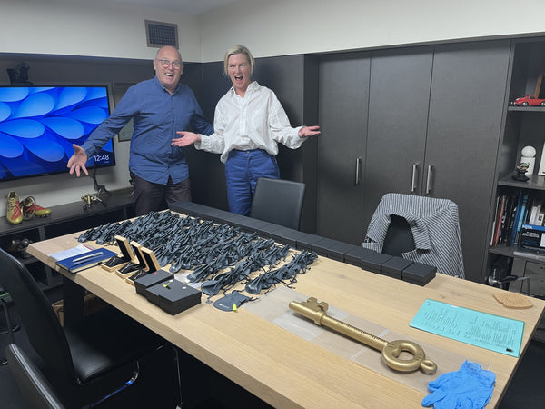 Ian Douglas, founder of The Village Goldsmith and Sarah Wickens from Wellington City Mission getting ready for the fundraising auction