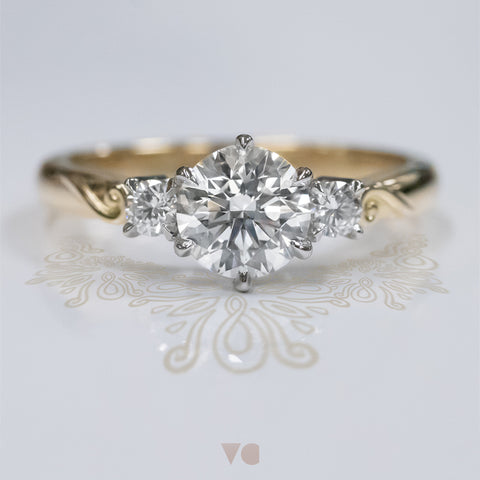 Awa koru motif pattern diamond three stone engagement ring in 18ct yellow gold The Narrative Collection
