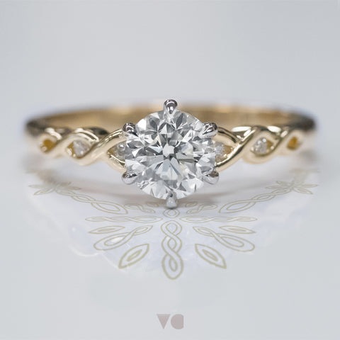 Pikorua maori polynesian triple twist diamond engagement ring design in 18ct yellow gold and platinum