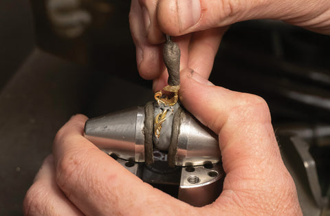 Setting fancy yellow pear shaped diamond into 18ct yellow gold vine design Climbing Ivy ring