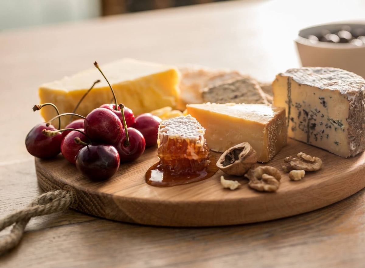 Cheese platter with cherries