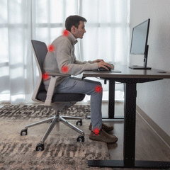 a moving image of a man sitting at a desk with poor posture then transitioning to him sitting with proper posture