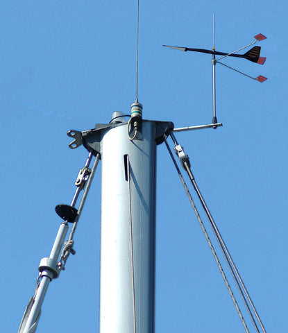 Sailing wind vane mounted on a mast