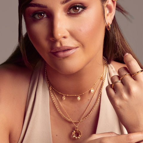 Jac Jossa wearing 3 gold plated chains from her Hot Diamonds collection