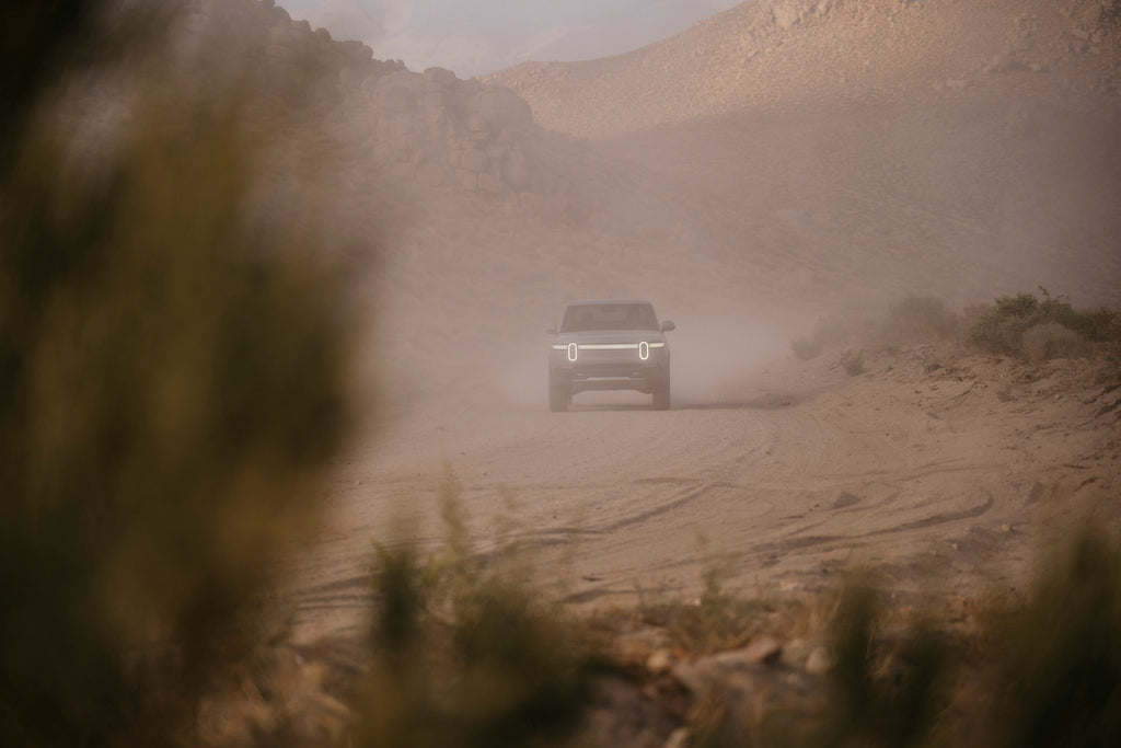 Front view of Limestone Rivian R1T at dusk in Bishop, CA