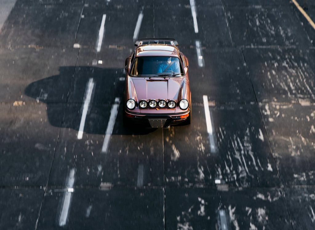 Cassis Red Metallic Porsche 911 Safari from above in Downtown Los Angeles