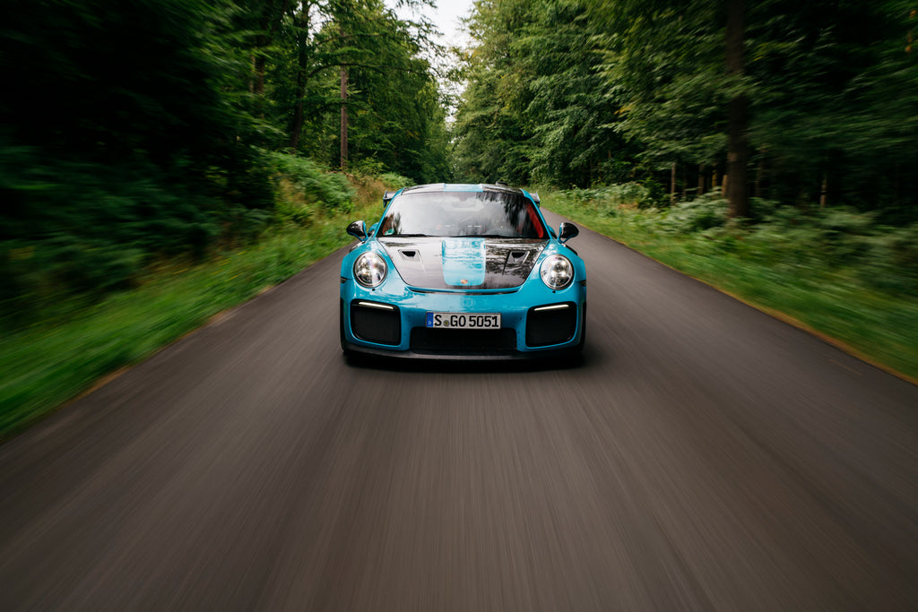 Rolling shot of Miami Blue 911 GT2 RS in Stavelot, Belgium