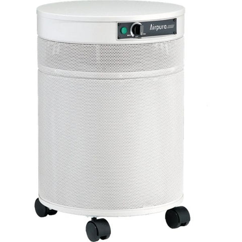 air purifier asthma - Woman in background of a white air purifier sleeping on a bed