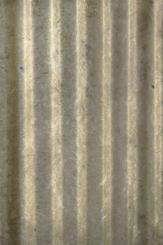 Wavy texture of fiberglass insulation, raising the question: Will an air purifier help with fiberglass particles in the air?