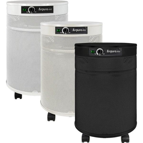 Trio of Airpura air purifiers in black and white, depicting different models to explore "Are air purifiers necessary?" in a home environment