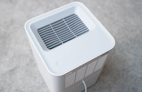 asthma air purifier - white - top down view of a vent hood