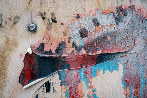 Wall with mold and dust mites colored on that could use an air purifier for cleansing