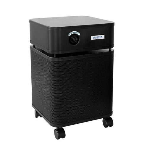 Black Austin air purifier with a top control dial, positioned against a white background, questioning "Do we need an air purifier?" for home use