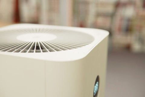 Extreme close up view of a white air purifier for allergies