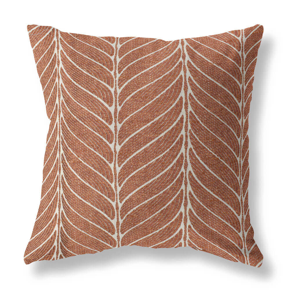 Brick and cream Valentine’s Day pillow in leaf frond pattern