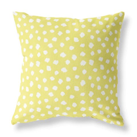 Yellow and white dotted pillow for the home
