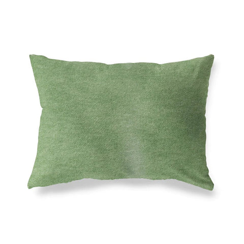 Fern green winter throw pillows against a white background.