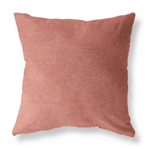 Rose velvet decorative winter pillows against a white background