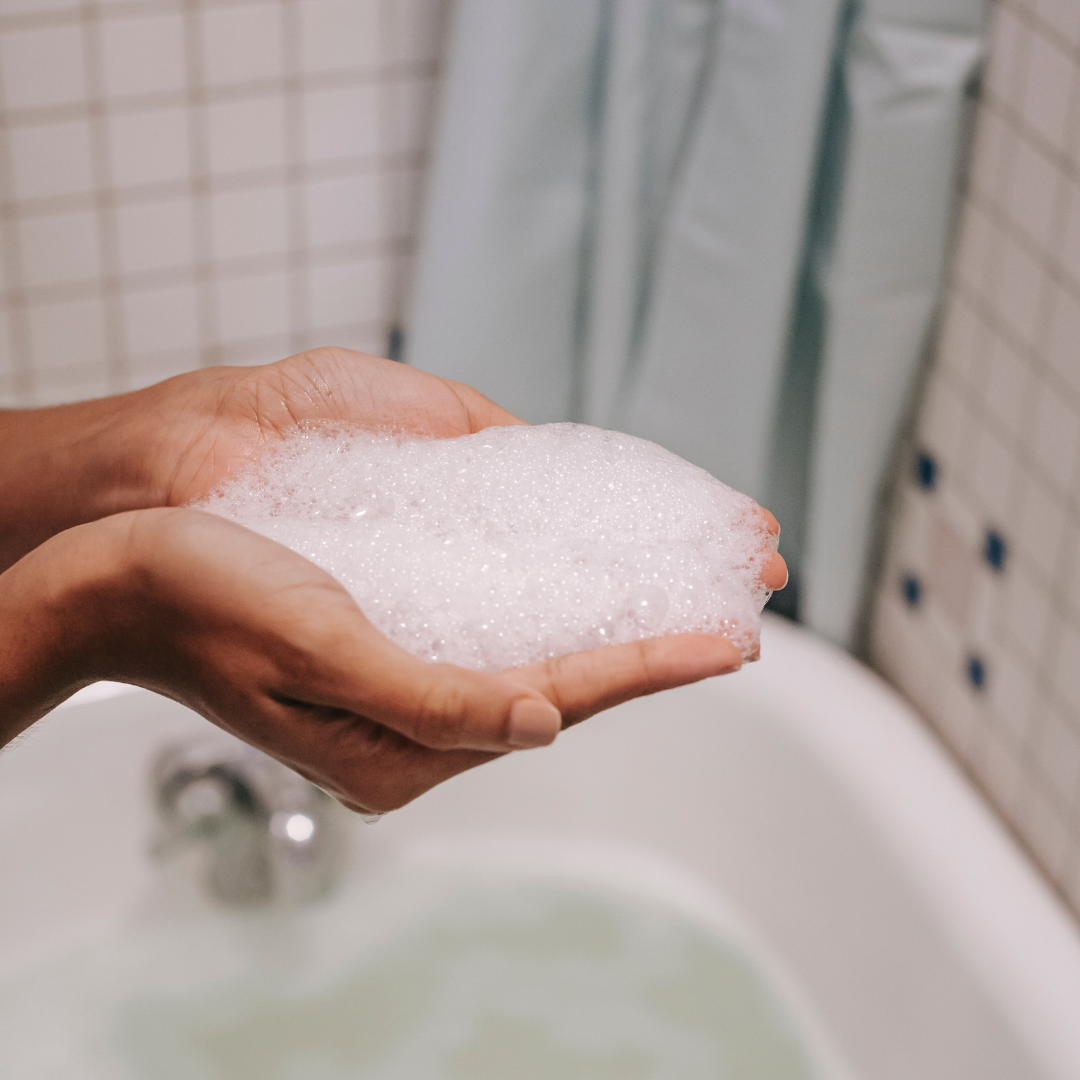 soap bubbles in hand