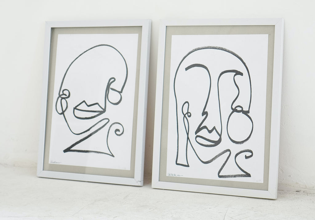 Framed line drawing faces