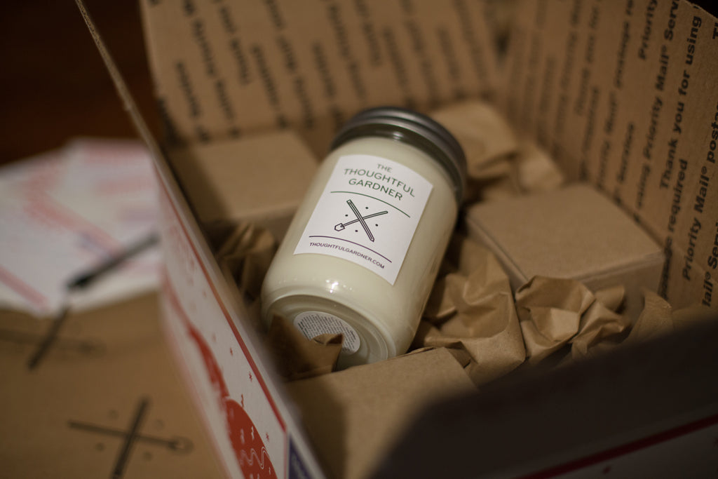 candle packaged in a cardboard box