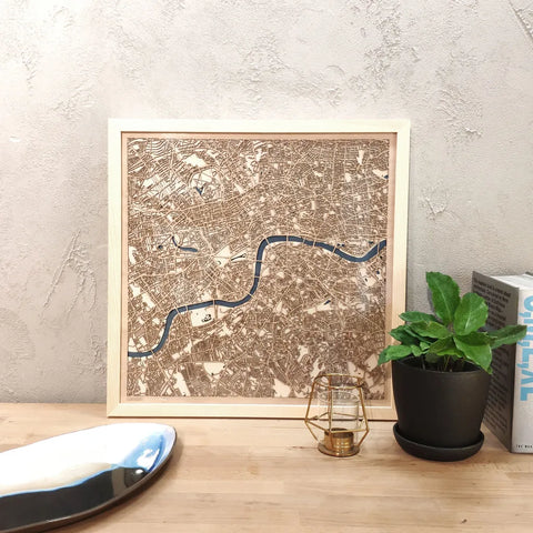 London CityWood Custom Wood Map laser cut maps https://thecitywood.com/ CityWood is a wooden map artwork. City streets, water - Laser Cut Wooden Maps - Award Wining Design by architect and designer Hubert Roguski