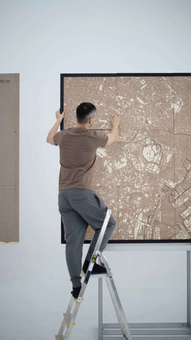 Behind the Scenes: Setting the Stage for 'Metropolis', a Hubert Roguski Exhibition - CityWood laser cut wooden map