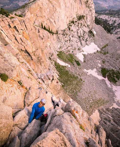 Climber climbing on an alpine route