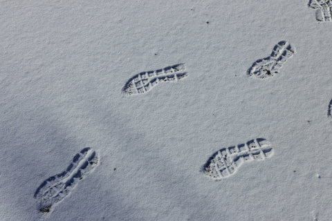 The footprints of musician Quinn Christopherson's hiking boots in the snow.