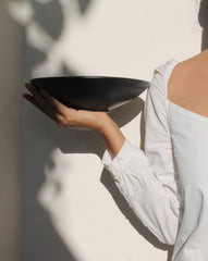 Osmos Bowl in the hand of a woman