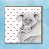 Greeting card with pink heart background, Koala and Baby Koala in centre