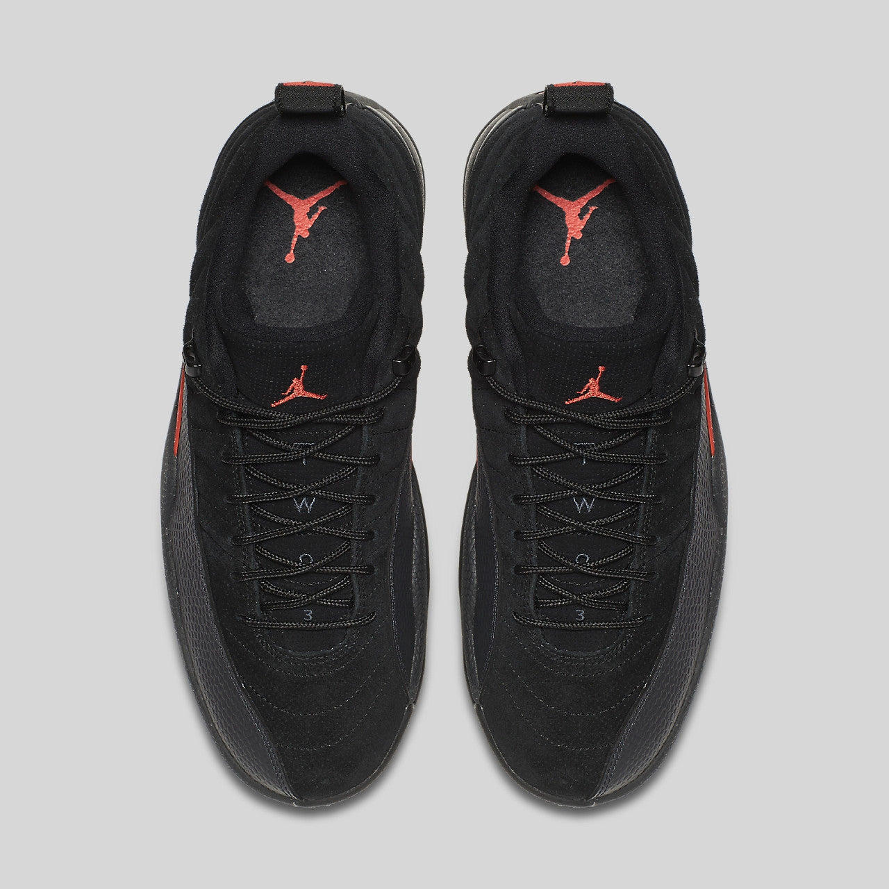 black and orange jordan 12 low